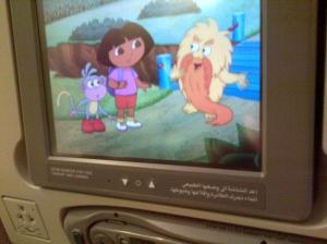 Learning Spanglish with Dora on the Emirates flight back to Dubai.